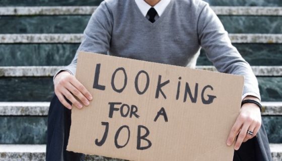 young man with job sign